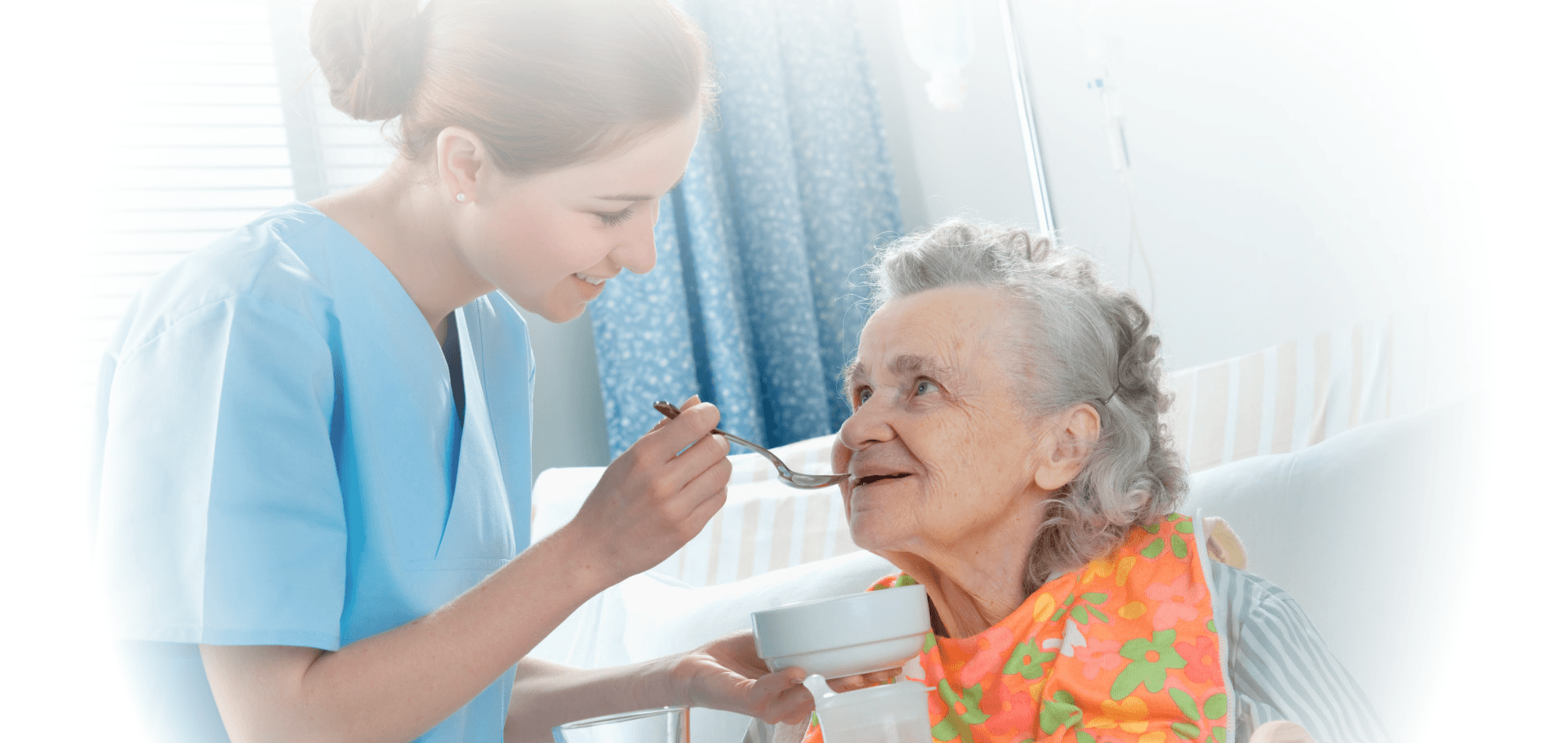 a lady and an old woman smiling