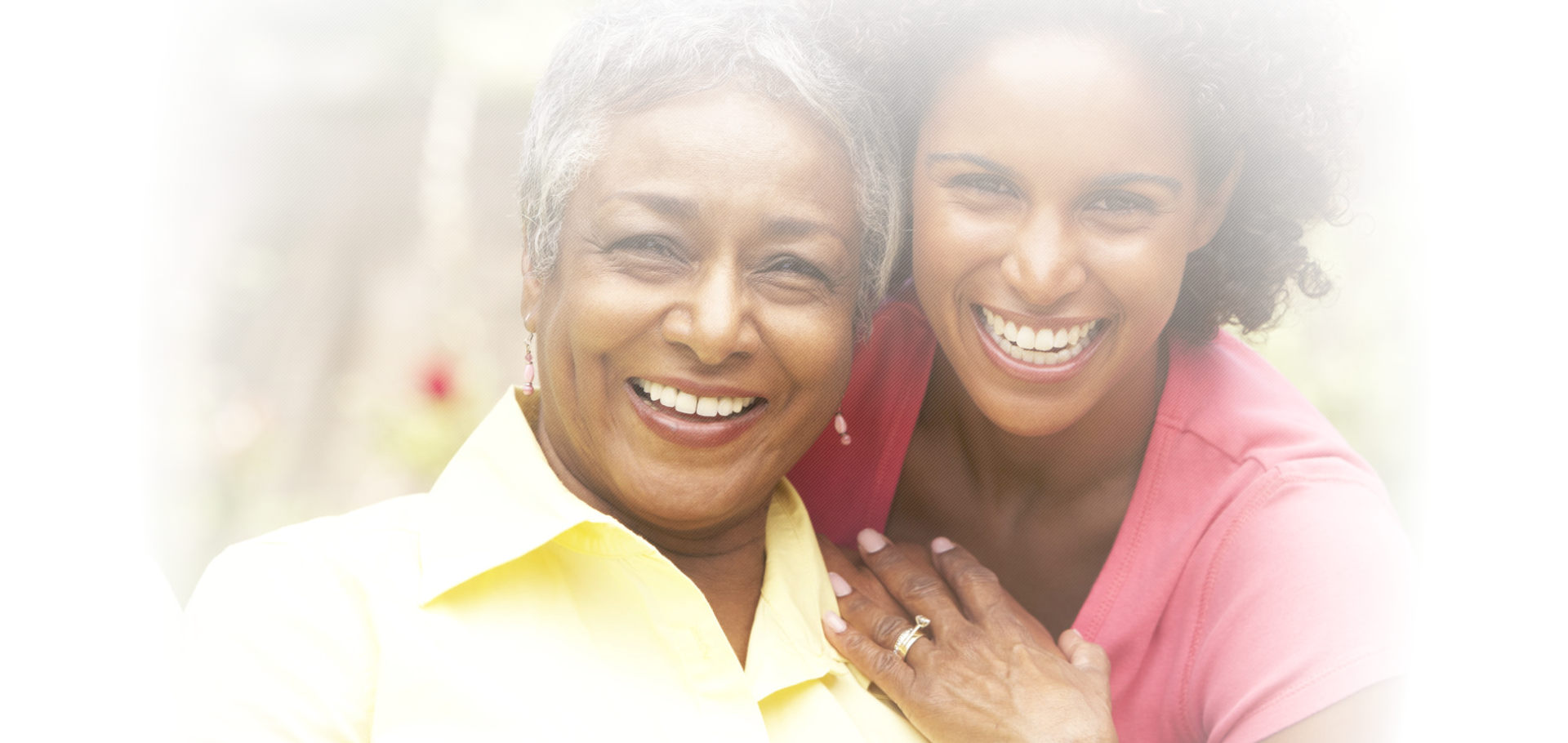 a lady and an old woman smiling