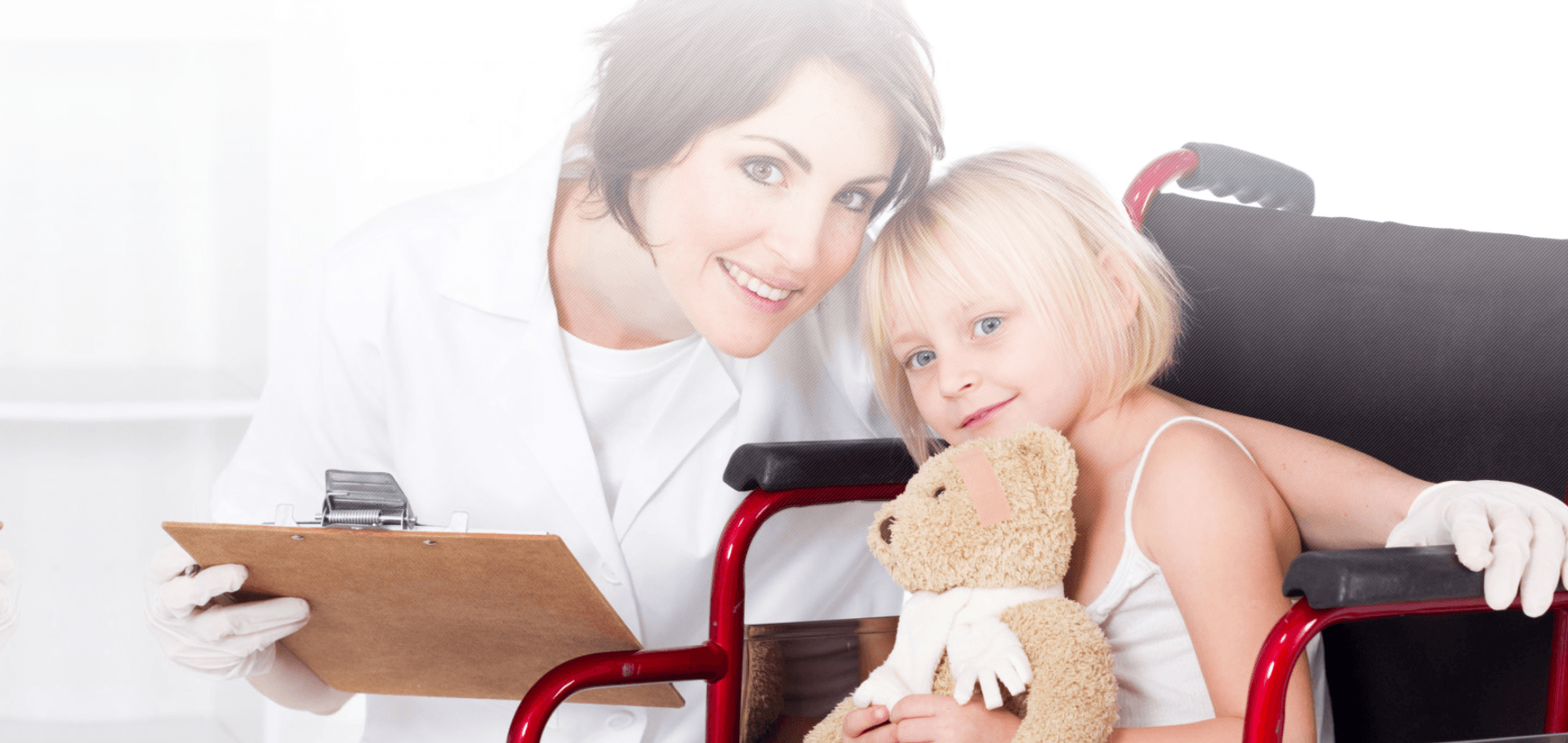 a lady and a child sitting on a chair