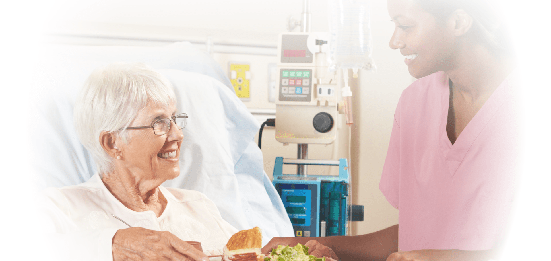 a couple having a conversation with a nurse