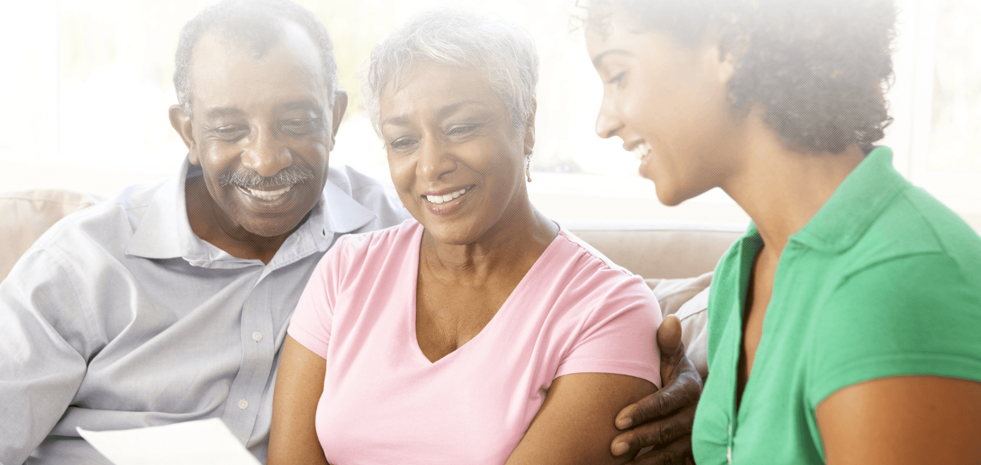 a lady showing results to a couple